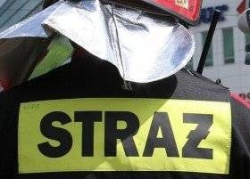 OŚWIĘCIM. Pożar śmieci w piwnicy budynku. Jedna osoba trafiła do szpitala